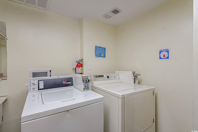 400 20th Ave N Unit 606, Myrtle Beach, SC 29577 - community laundry room featuring washing machine and clothes dryer