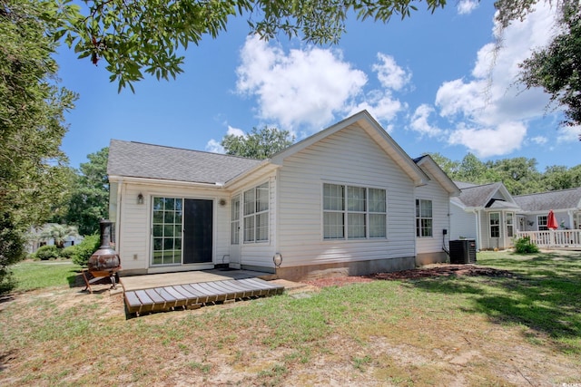 23 Robert Conway Ct, Georgetown, SC 29440 - back of house with a wooden deck and a lawn