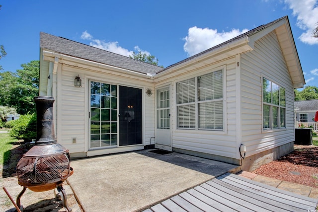 23 Robert Conway Ct, Georgetown, SC 29440 - back of house featuring a patio and a shingled roof