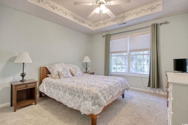 23 Robert Conway Ct, Georgetown, SC 29440 - bedroom featuring light colored carpet, a raised ceiling, and a ceiling fan