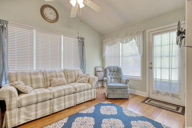 23 Robert Conway Ct, Georgetown, SC 29440 - living room featuring vaulted ceiling, ceiling fan, and wood finished floors