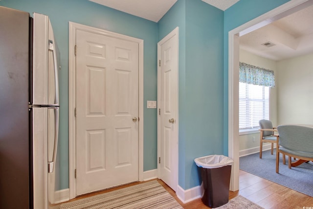 23 Robert Conway Ct, Georgetown, SC 29440 - foyer with light wood-style flooring and baseboards