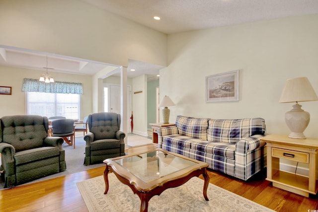 23 Robert Conway Ct, Georgetown, SC 29440 - living area featuring wood finished floors, a chandelier, and recessed lighting