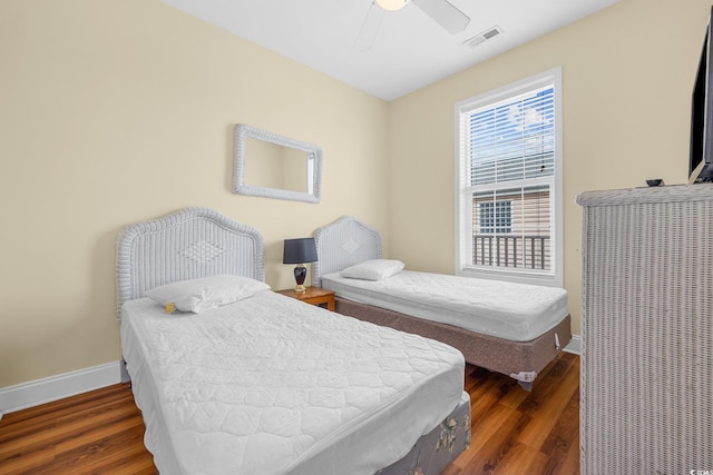 817 S Ocean Blvd Unit 201, North Myrtle Beach, SC 29582 - bedroom with wood finished floors and a ceiling fan