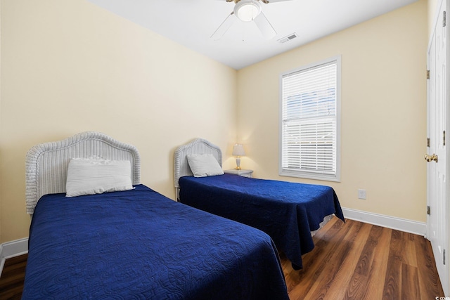817 S Ocean Blvd Unit 201, North Myrtle Beach, SC 29582 - bedroom featuring wood finished floors and ceiling fan