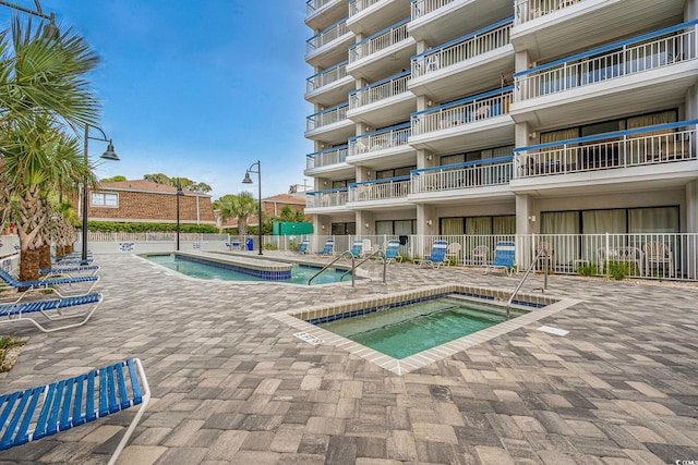 5511 N Ocean Blvd Unit 902, Myrtle Beach, SC 29577 - community pool featuring a community hot tub and a patio