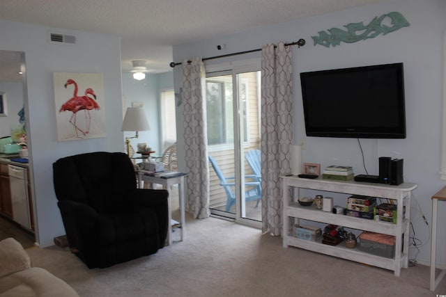 1025 Plantation Dr W Unit 2625/2626, Little River, SC 29566 - living area with light colored carpet, a textured ceiling, and ceiling fan
