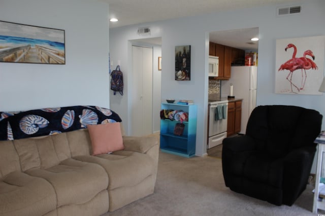 1025 Plantation Dr W Unit 2625/2626, Little River, SC 29566 - living room with light carpet and recessed lighting