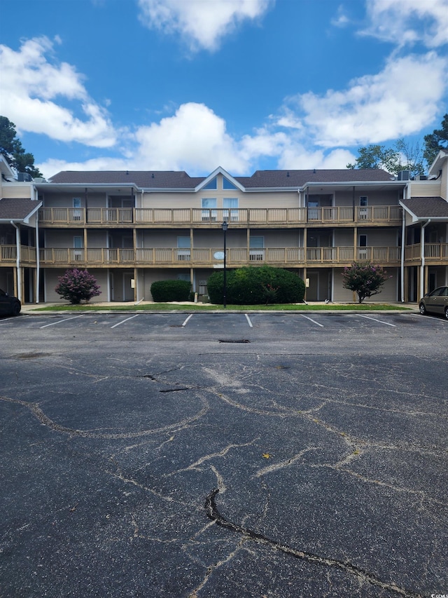 1025 Plantation Dr W Unit 2625/2626, Little River, SC 29566 - view of building exterior with uncovered parking