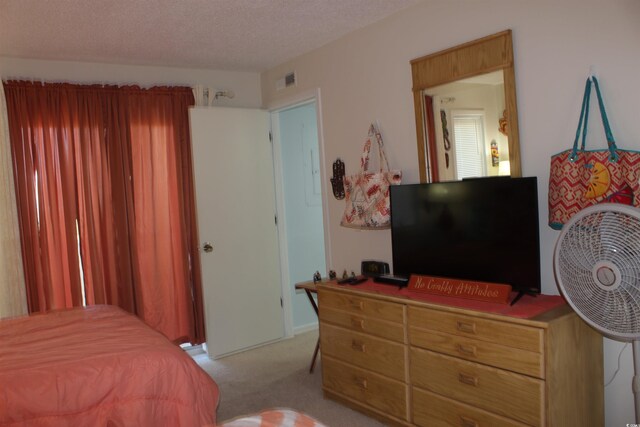 1025 Plantation Dr W Unit 2625/2626, Little River, SC 29566 - carpeted bedroom featuring a textured ceiling