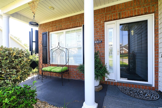 417 Pennington Loop, Myrtle Beach, SC 29588 - view of exterior entry with a porch and brick siding