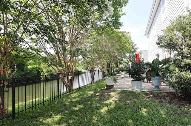 417 Pennington Loop, Myrtle Beach, SC 29588 - fenced backyard featuring a patio