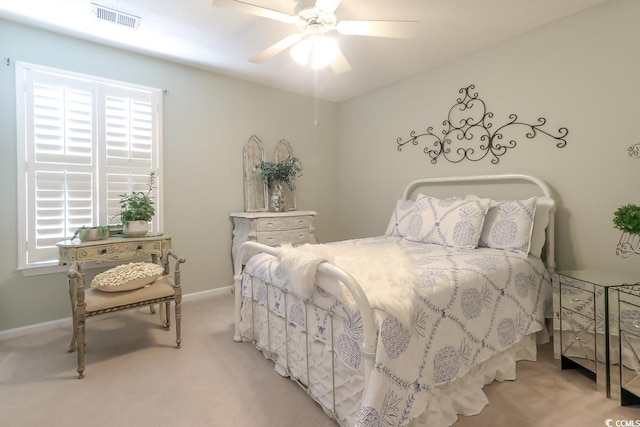 417 Pennington Loop, Myrtle Beach, SC 29588 - bedroom with light carpet, multiple windows, and a ceiling fan