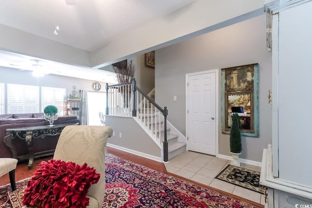 417 Pennington Loop, Myrtle Beach, SC 29588 - foyer entrance featuring stairs, light tile patterned floors, and a ceiling fan