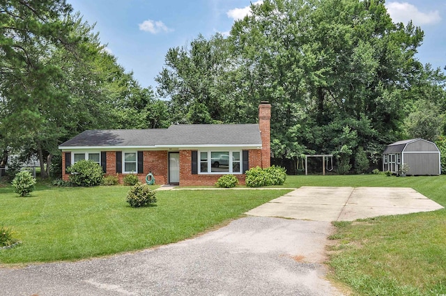 728 Tarpon Ct, Myrtle Beach, SC 29579 - ranch-style house with a storage unit, a chimney, and brick siding