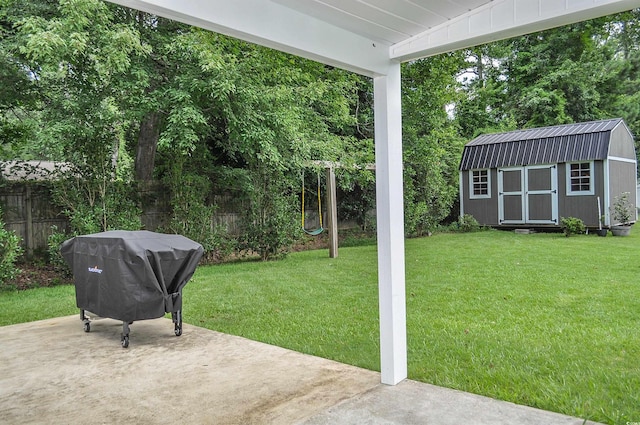 728 Tarpon Ct, Myrtle Beach, SC 29579 - view of yard featuring a storage shed and a patio