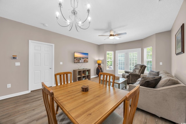 4502 Ailsa Ct Unit B, Conway, SC 29526 - dining area featuring light wood-style flooring, ceiling fan, and a chandelier