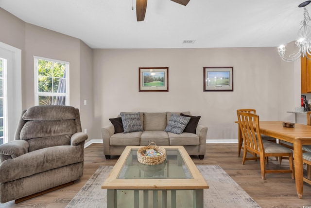 4502 Ailsa Ct Unit B, Conway, SC 29526 - living room featuring a chandelier, light wood-style flooring, and ceiling fan