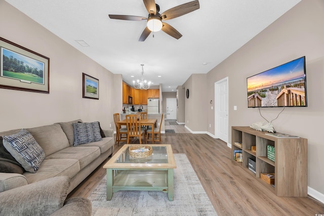 4502 Ailsa Ct Unit B, Conway, SC 29526 - living area with a chandelier, light wood-type flooring, a ceiling fan, and recessed lighting