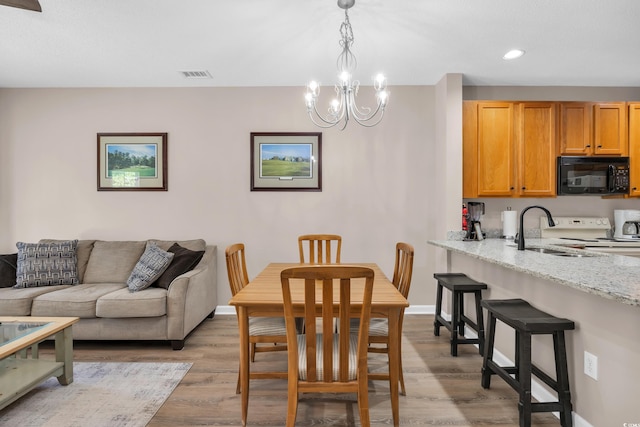 4502 Ailsa Ct Unit B, Conway, SC 29526 - dining area featuring recessed lighting, a chandelier, and light wood finished floors