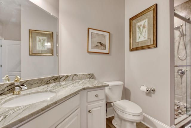 2180 Waterview Dr Unit 721, North Myrtle Beach, SC 29582 - bathroom featuring vanity, a shower stall, and wood finished floors