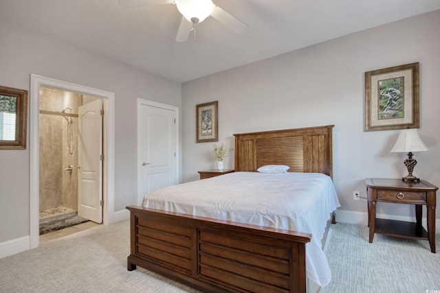 2180 Waterview Dr Unit 721, North Myrtle Beach, SC 29582 - bedroom featuring light colored carpet, ceiling fan, and ensuite bath