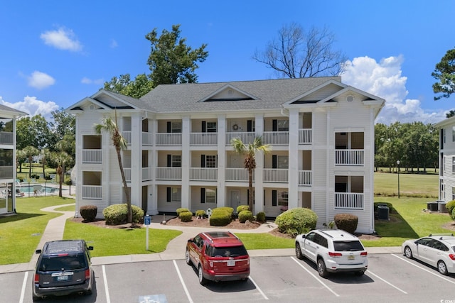 493 White River Dr Unit 28-D, Myrtle Beach, SC 29579 - view of property with uncovered parking