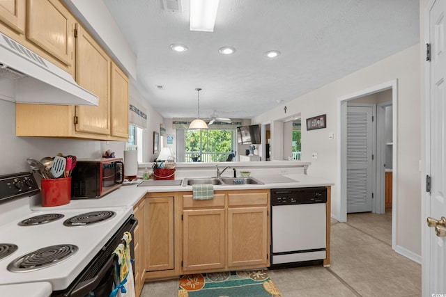 493 White River Dr Unit 28-D, Myrtle Beach, SC 29579 - kitchen featuring white appliances, under cabinet range hood, a peninsula, light countertops, and recessed lighting