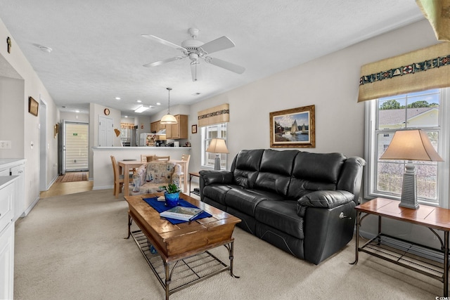 493 White River Dr Unit 28-D, Myrtle Beach, SC 29579 - living room featuring light colored carpet and a ceiling fan