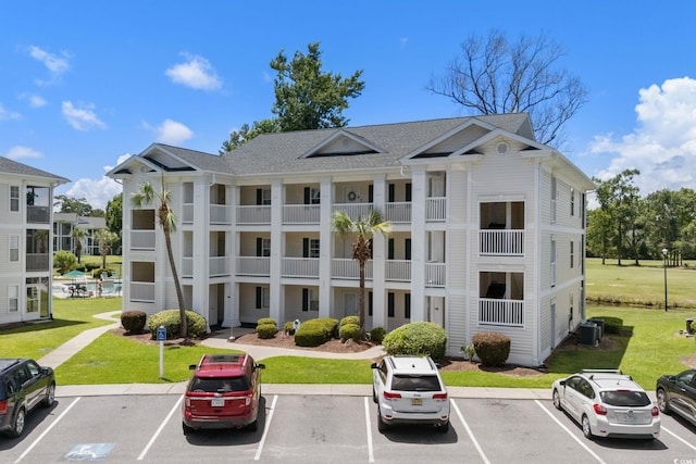 493 White River Dr Unit 28-D, Myrtle Beach, SC 29579 - view of building exterior with uncovered parking