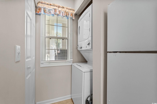 493 White River Dr Unit 28-D, Myrtle Beach, SC 29579 - laundry area featuring stacked washer / dryer and healthy amount of natural light