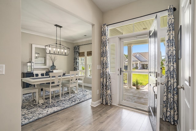 860 Brant St, Myrtle Beach, SC 29579 - foyer featuring wood finished floors, a chandelier, and crown molding