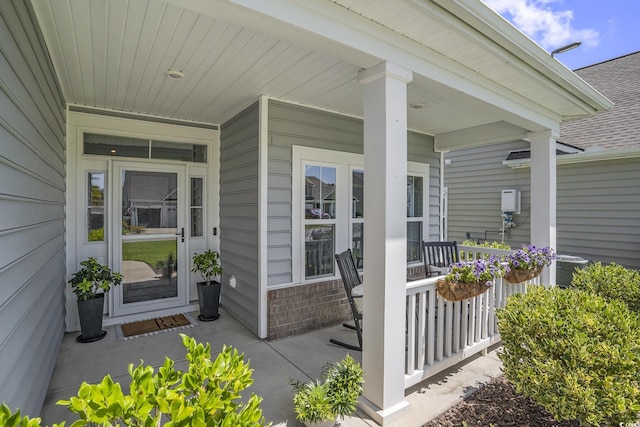 860 Brant St, Myrtle Beach, SC 29579 - property entrance featuring covered porch and a shingled roof