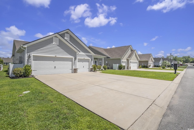 860 Brant St, Myrtle Beach, SC 29579 - view of front facade featuring a garage, a front lawn, and driveway