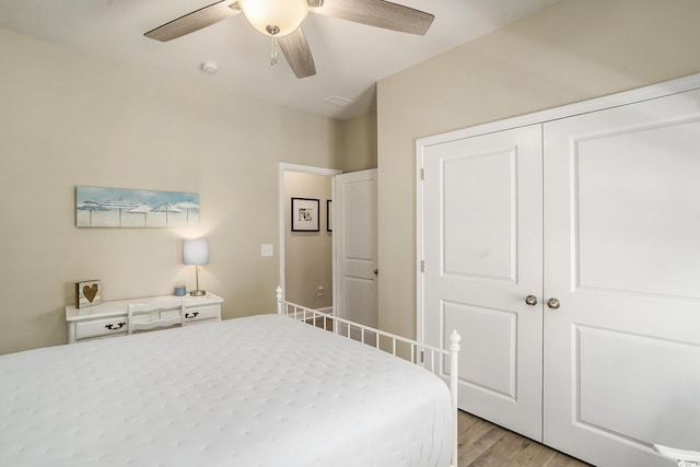 860 Brant St, Myrtle Beach, SC 29579 - bedroom with light wood-type flooring, a ceiling fan, and a closet