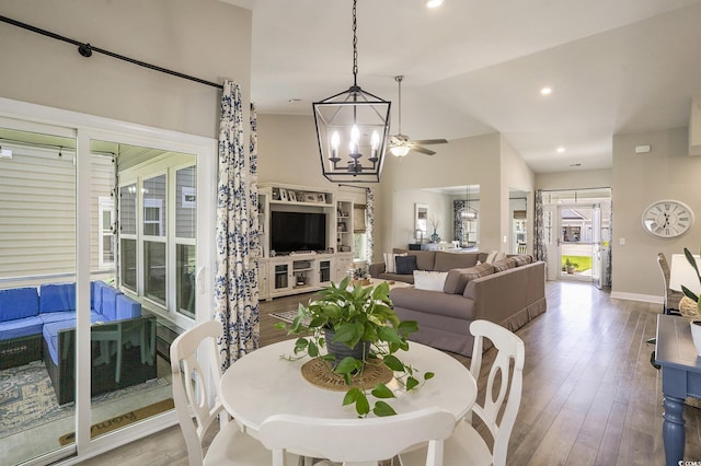 860 Brant St, Myrtle Beach, SC 29579 - dining room with wood finished floors, a chandelier, a ceiling fan, lofted ceiling, and recessed lighting