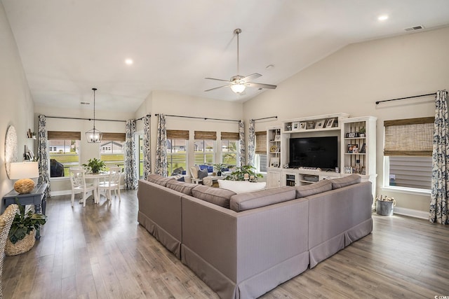 860 Brant St, Myrtle Beach, SC 29579 - living room featuring ceiling fan, light wood finished floors, recessed lighting, and high vaulted ceiling