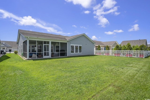 860 Brant St, Myrtle Beach, SC 29579 - rear view of property featuring a sunroom and a fenced backyard