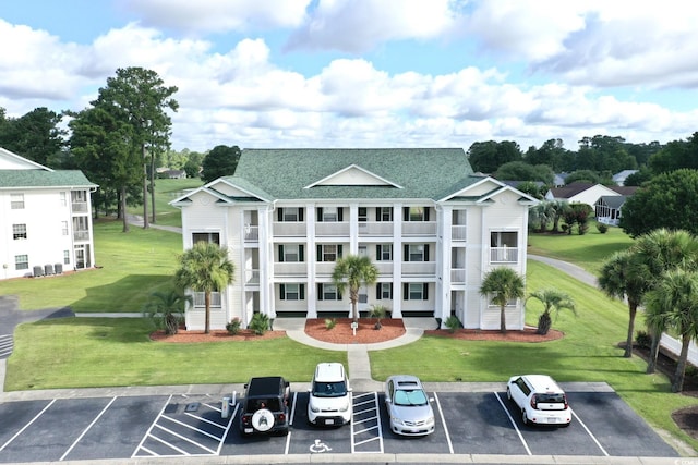 697 Tupelo Ln Unit 24G, Longs, SC 29568 - view of building exterior featuring uncovered parking