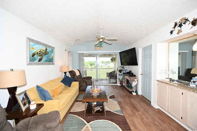 697 Tupelo Ln Unit 24G, Longs, SC 29568 - living area with wood finished floors, ceiling fan, a textured ceiling, and lofted ceiling