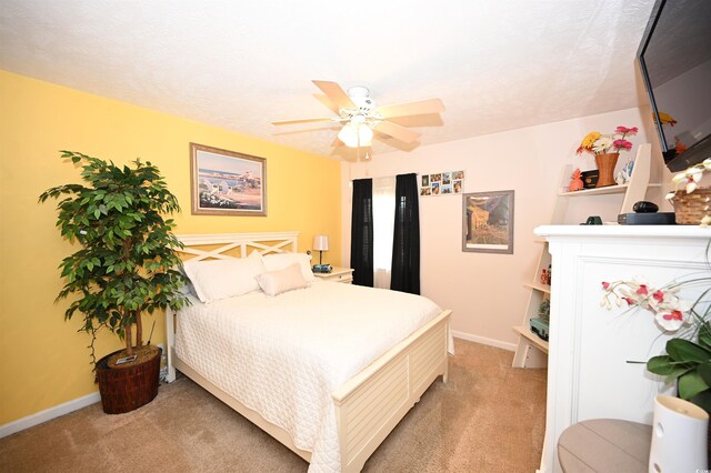 697 Tupelo Ln Unit 24G, Longs, SC 29568 - bedroom with light carpet and ceiling fan