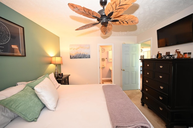 697 Tupelo Ln Unit 24G, Longs, SC 29568 - bedroom featuring light carpet, ensuite bath, and ceiling fan