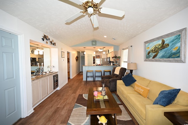 697 Tupelo Ln Unit 24G, Longs, SC 29568 - living area featuring wine cooler, a textured ceiling, dark wood-style flooring, ceiling fan, and lofted ceiling