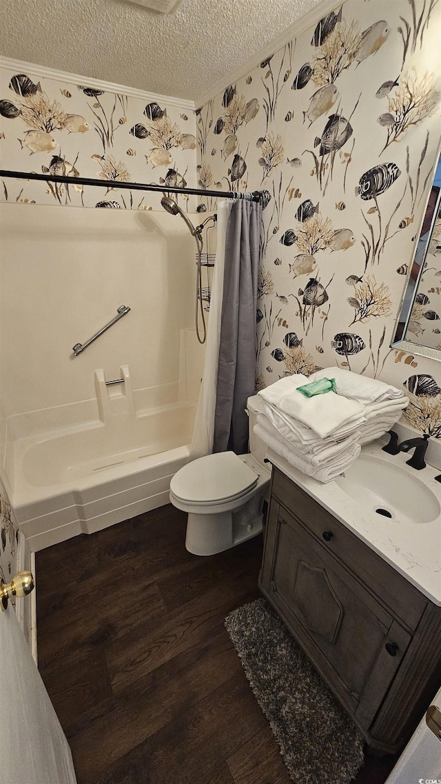 405 21st Ave S Unit 2J, North Myrtle Beach, SC 29582 - bathroom featuring wood finished floors, a textured ceiling, and vanity