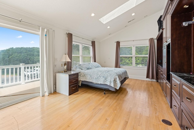 5000 N Ocean Blvd, Myrtle Beach, SC 29577 - bedroom with a skylight, ornamental molding, lofted ceiling, light wood-style floors, and recessed lighting
