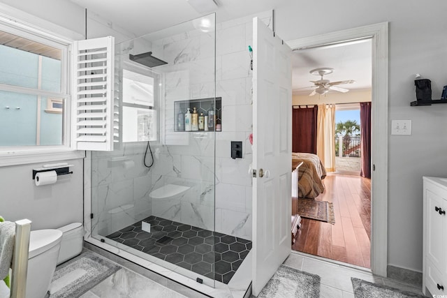 5000 N Ocean Blvd, Myrtle Beach, SC 29577 - bathroom featuring a marble finish shower, ensuite bath, and ceiling fan