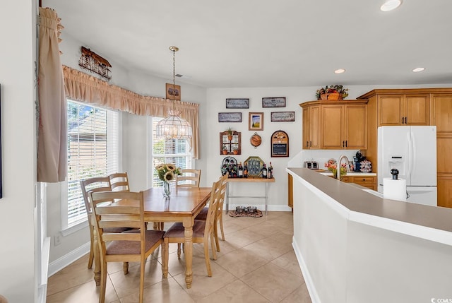 4507 Smilax Pl, Murrells Inlet, SC 29576 - dining space with healthy amount of natural light, recessed lighting, light tile patterned floors, and a chandelier