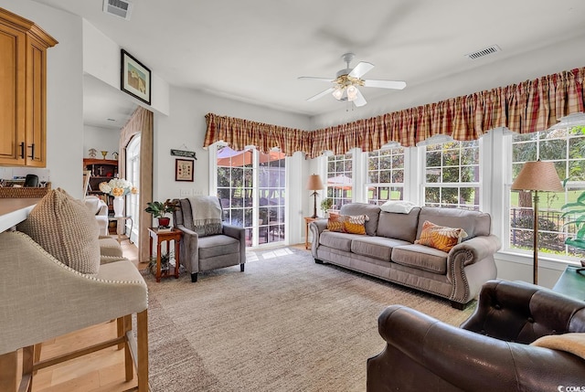 4507 Smilax Pl, Murrells Inlet, SC 29576 - living room featuring plenty of natural light and a ceiling fan