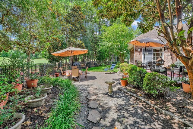 4507 Smilax Pl, Murrells Inlet, SC 29576 - fenced backyard featuring a patio area