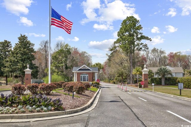 4507 Smilax Pl, Murrells Inlet, SC 29576 - view of asphalt road featuring traffic signs and curbs